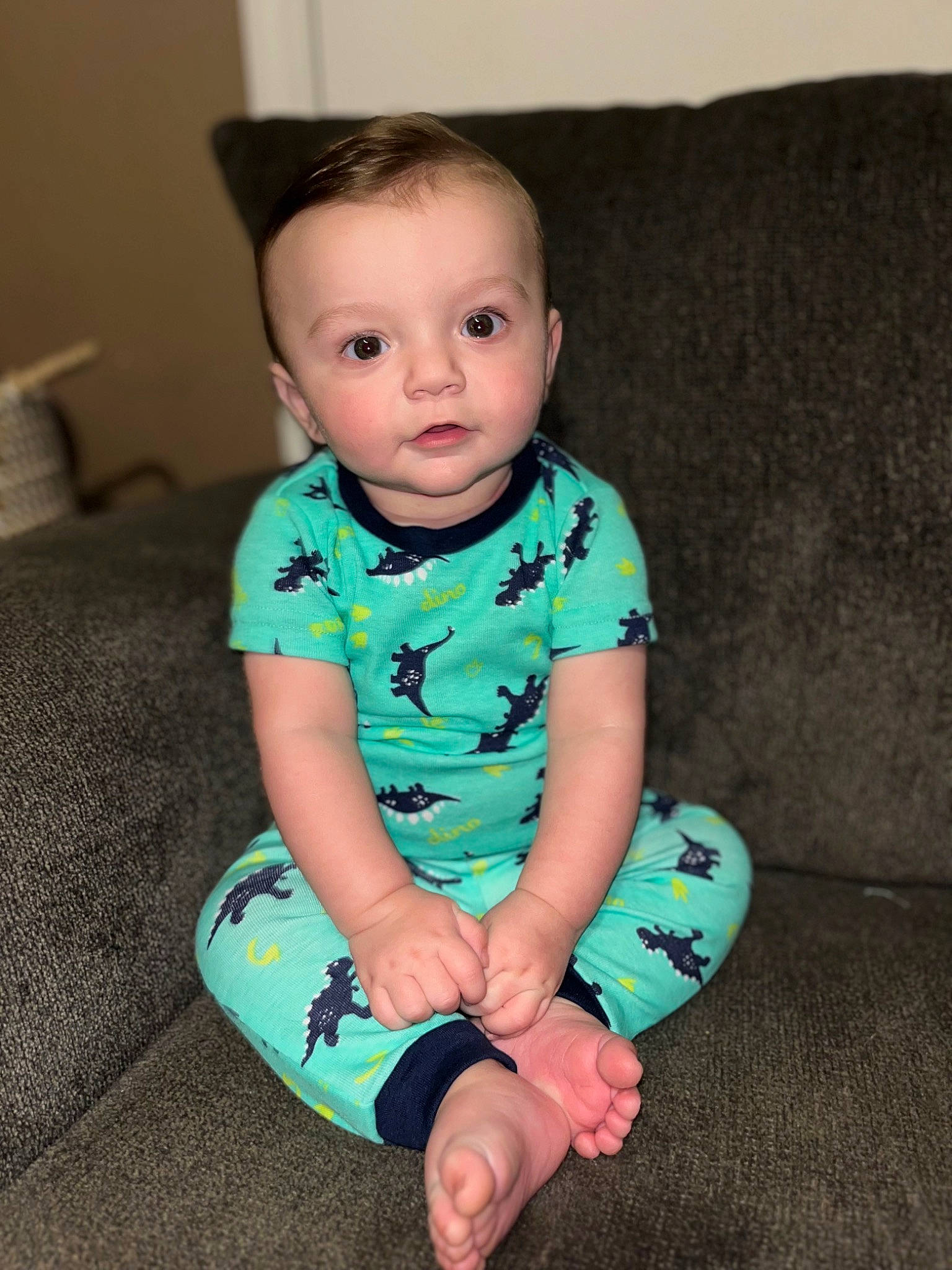 Kamden joined the competition — help win amazing prizes! baby, baby_toddler_clothing, cheek, child, comfort, couch, electric_blue, eye, flash_photography, flooring, head, human_leg, pattern, person, sitting, sleeve, t_shirt, toddler