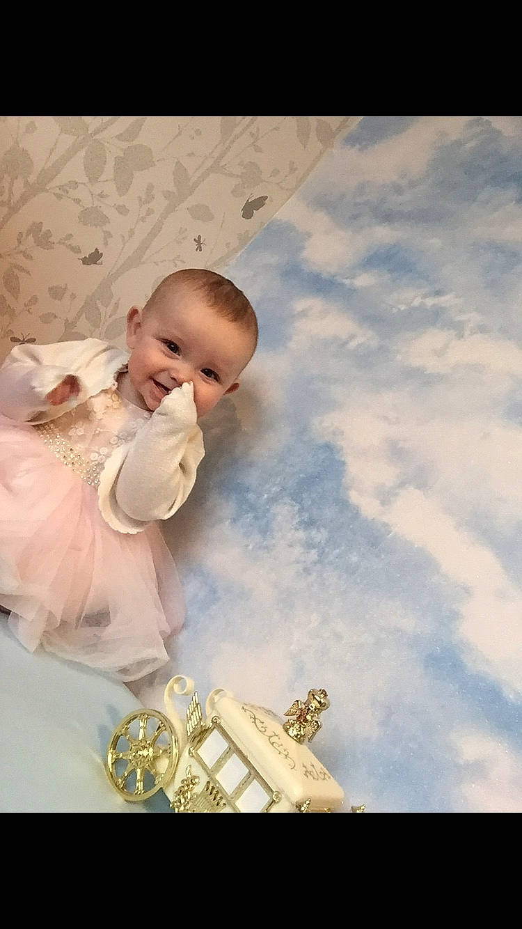 Lily-rose is registered to the contest to win money with this photo: baby, brass_instrument, child, happy, head, joy, person, photograph, photography, smile, toddler, white