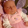 adorable, baby, child, costume, cute, fairy_wings, flower, hand, headband, indoors, infant, long_sleeves, newborn, peaceful, pink_dress, portrait, resting, sleeping, soft_lighting, tulle_skirt