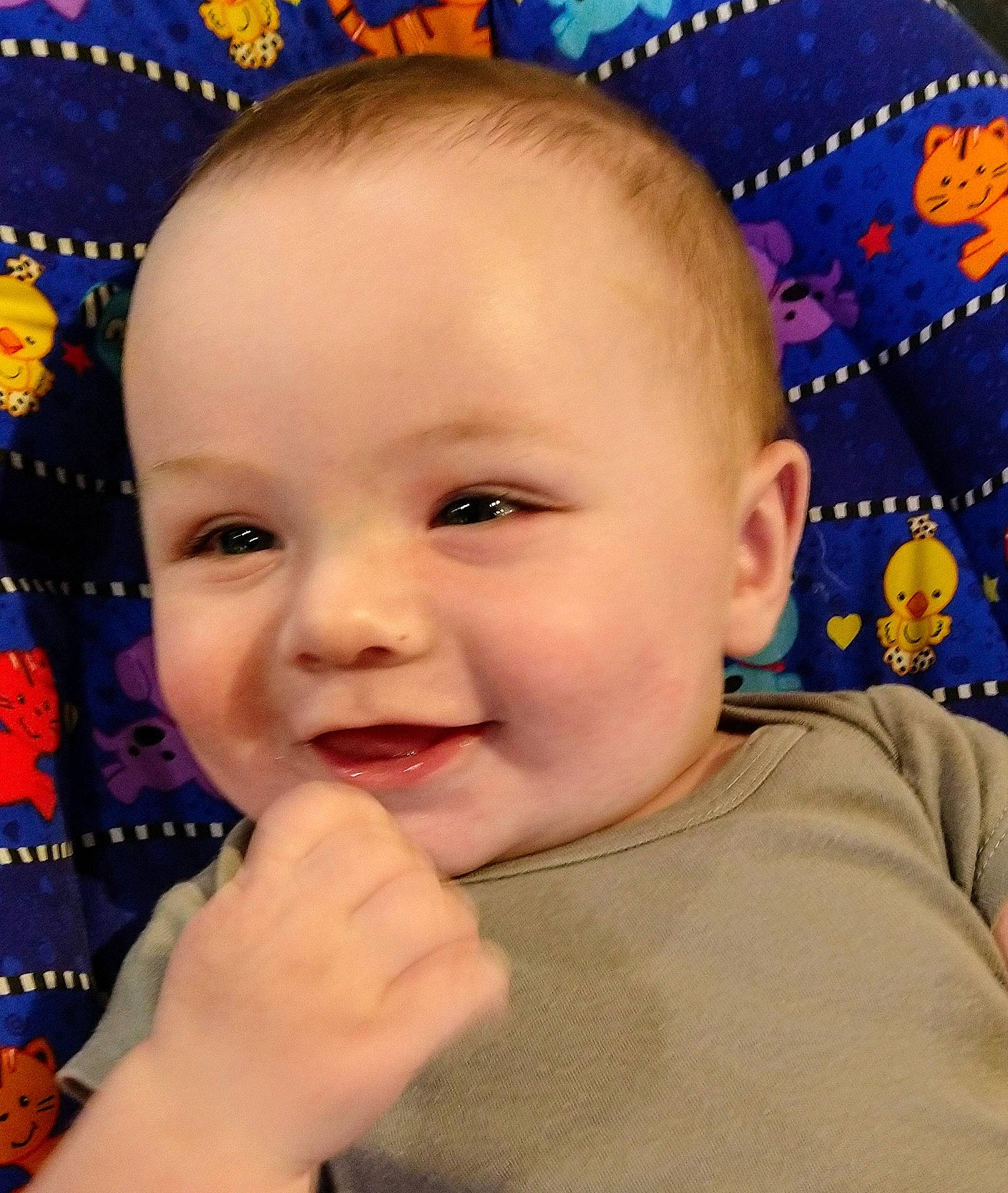 Gaige is registered to the contest to win money with this photo: baby, blue, cheek, chin, cool, ear, eyebrow, eyelash, facial_expression, finger, forehead, gesture, hairstyle, happy, iris, joy, lip, mouth, nose, person