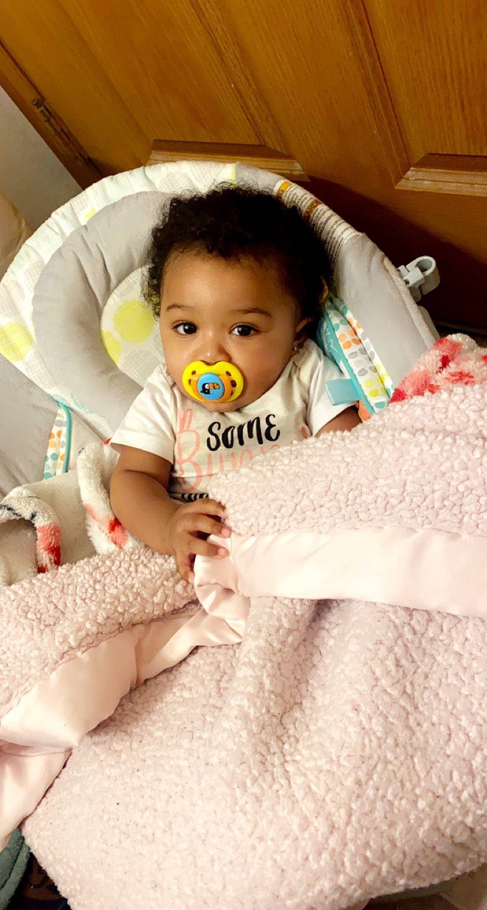 Blessyn is registered to the contest to win money with this photo: baby, baby_products, baby_safety, baby_toddler_clothing, cheek, child, comfort, eyelash, flooring, hair, happy, head, iris, linens, person, room, sitting, skin, sleeve, textile