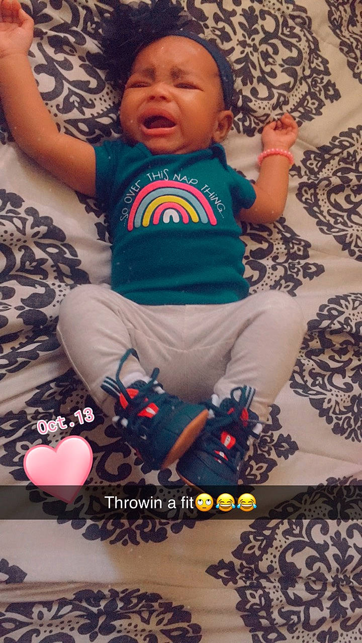 Akyla is registered to the contest to win money with this photo: baby, baby_toddler_clothing, beauty, child, comfort, cool, design, eye, finger, fun, happy, headwear, linens, pattern, person, photograph, pink, sitting, sleeve, sorrow