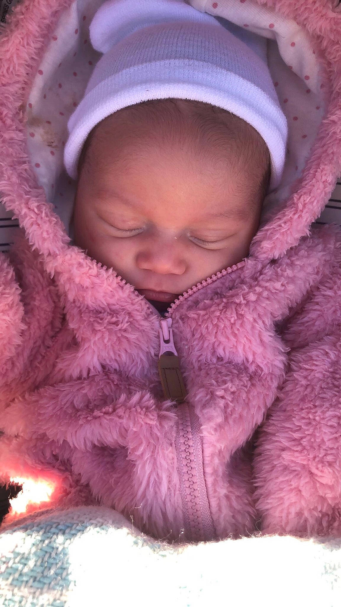 Capri joined the competition — help win amazing prizes! baby_sleeping, baby_toddler_clothing, bonnet, cap, cheek, child, comfort, cool, fur, fur_clothing, hood, lip, magenta, nap, person, pink, textile, toddler, violet, winter