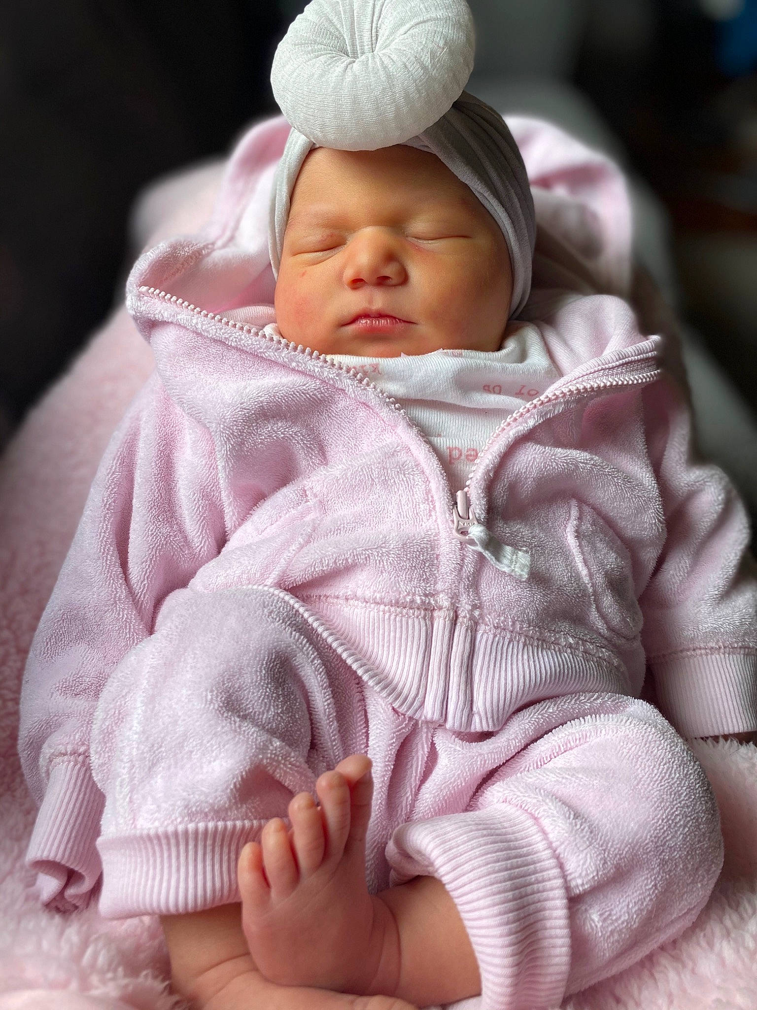 Capri joined the competition — help win amazing prizes! baby, baby_products, baby_sleeping, baby_toddler_clothing, beanie, bonnet, cheek, child, comfort, finger, foot, headwear, knit_cap, nail, person, pink, product, skin, textile, toddler