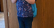 Hermione joined the competition — help win amazing prizes! child, girl, toddler, portrait, standing, smiling, backpack, school, floral_shirt, jeans, sneakers, sparkly_shoes, blonde_hair, hair_bows, indoor, door, wood_paneling, carpet, hallway, casual_clothing
