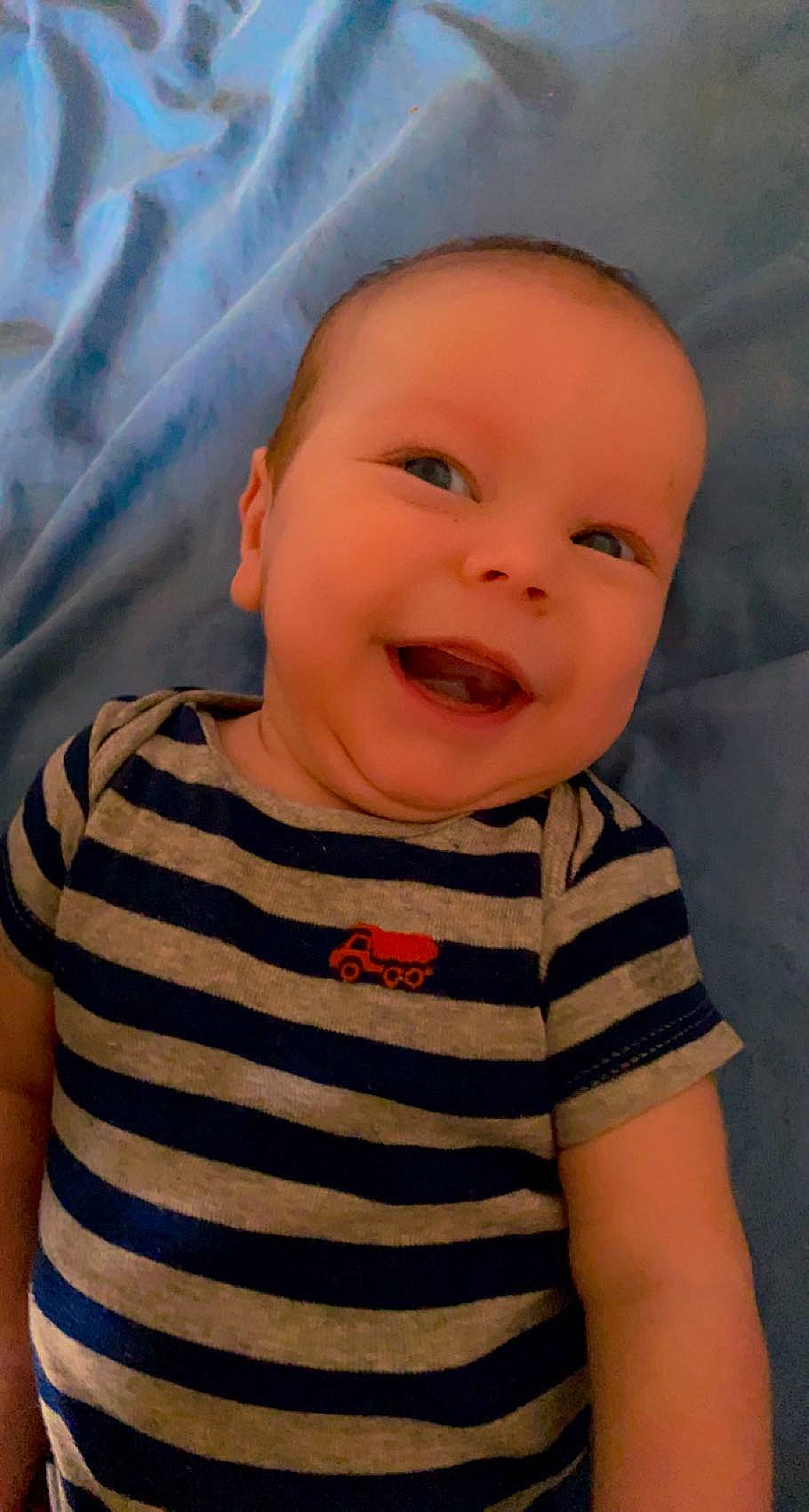 Bowen is registered to the contest to win money with this photo: baby, baby_laughing, baby_toddler_clothing, cheek, chin, cool, eye, eyebrow, face, forehead, happy, headwear, iris, joy, lip, mouth, nose, person, pink, skin