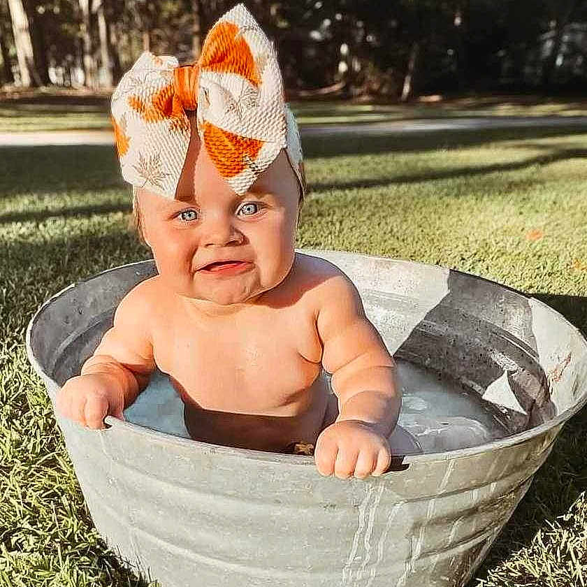 Sadie is registered to the contest to win money with this photo: baby, babylaughing, bathing, bathtub, cap, clothing, costume, face, happy, hat, head, nature, newborn, person, photography, plant, portrait, pottedplant, sitting, tub