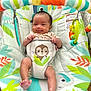 Nora joined the competition — help win amazing prizes! baby, infant, smiling, baby_bouncer, toy, colorful, animal_print, leaf_pattern, happy, cute, indoor, child, seat, playful, small_hands, small_feet, fabric, comfort, young, cheerful