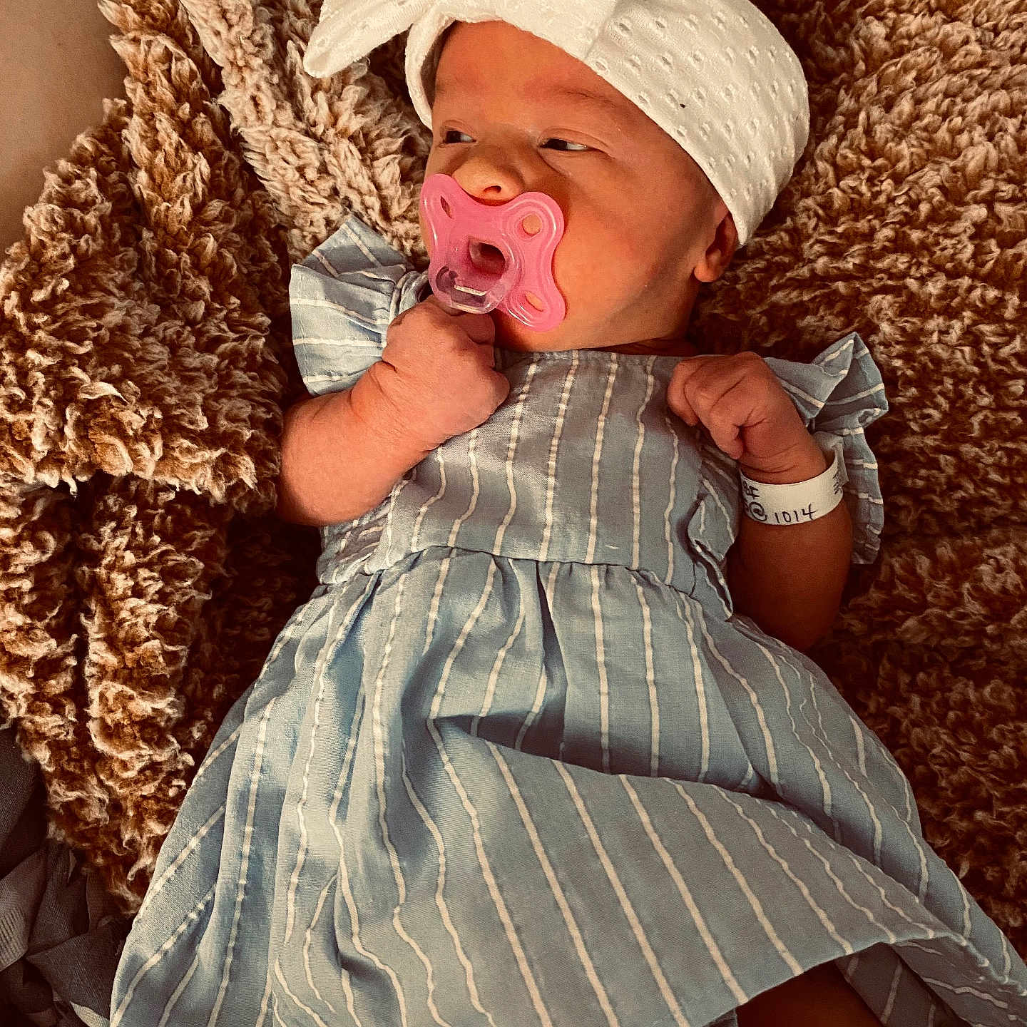 Kinzleigh joined the competition — help win amazing prizes! baby, blanket, bodypart, bonnet, cap, clothing, couch, dress, face, furniture, hat, head, newborn, person, photography, portrait, quilt, sitting, sleeping, yawning