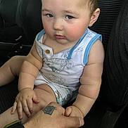 Dexter joined the competition — help win amazing prizes! accessories, arm, baby, bodypart, clothing, cushion, face, finger, hand, head, homedecor, person, photography, portrait, shorts, sitting, skin, t_shirt, tattoo, wrist