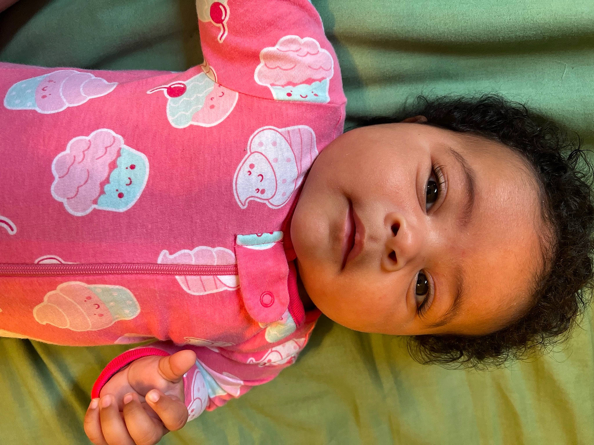 Dominique joined the competition — help win amazing prizes! baby, baby_toddler_clothing, cheek, child, comfort, eyelash, facial_expression, hand, happy, human_body, lip, magenta, nose, pattern, person, pink, product, skin, sleeve, textile