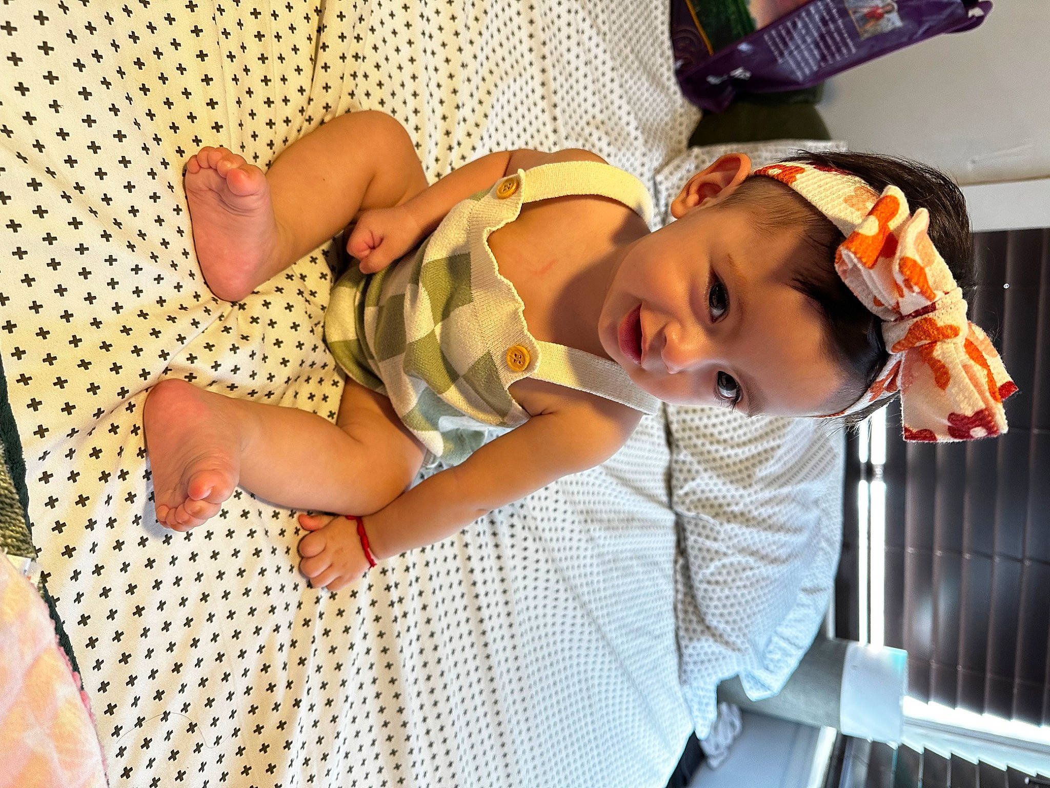 Meadow is registered to the contest to win money with this photo: baby, baby_products, baby_safety, baby_toddler_clothing, child, comfort, flooring, foot, fun, happy, human_leg, pattern, person, room, sock, thigh, toddler