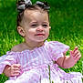 toddler, child, grass, outdoor, dress, pink, striped, pigtails, hair_bows, sunlight, greenery, cute, baby, sitting, nature, portrait, smile, happy, young, person
