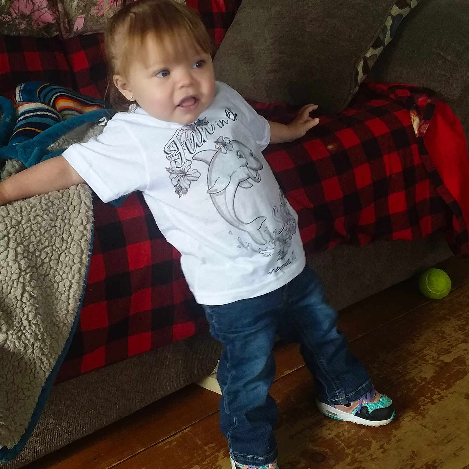 Dorothy is registered to the contest to win money with this photo: baby, child, design, leg, pattern, person, plaid, sitting, tartan, textile, toddler