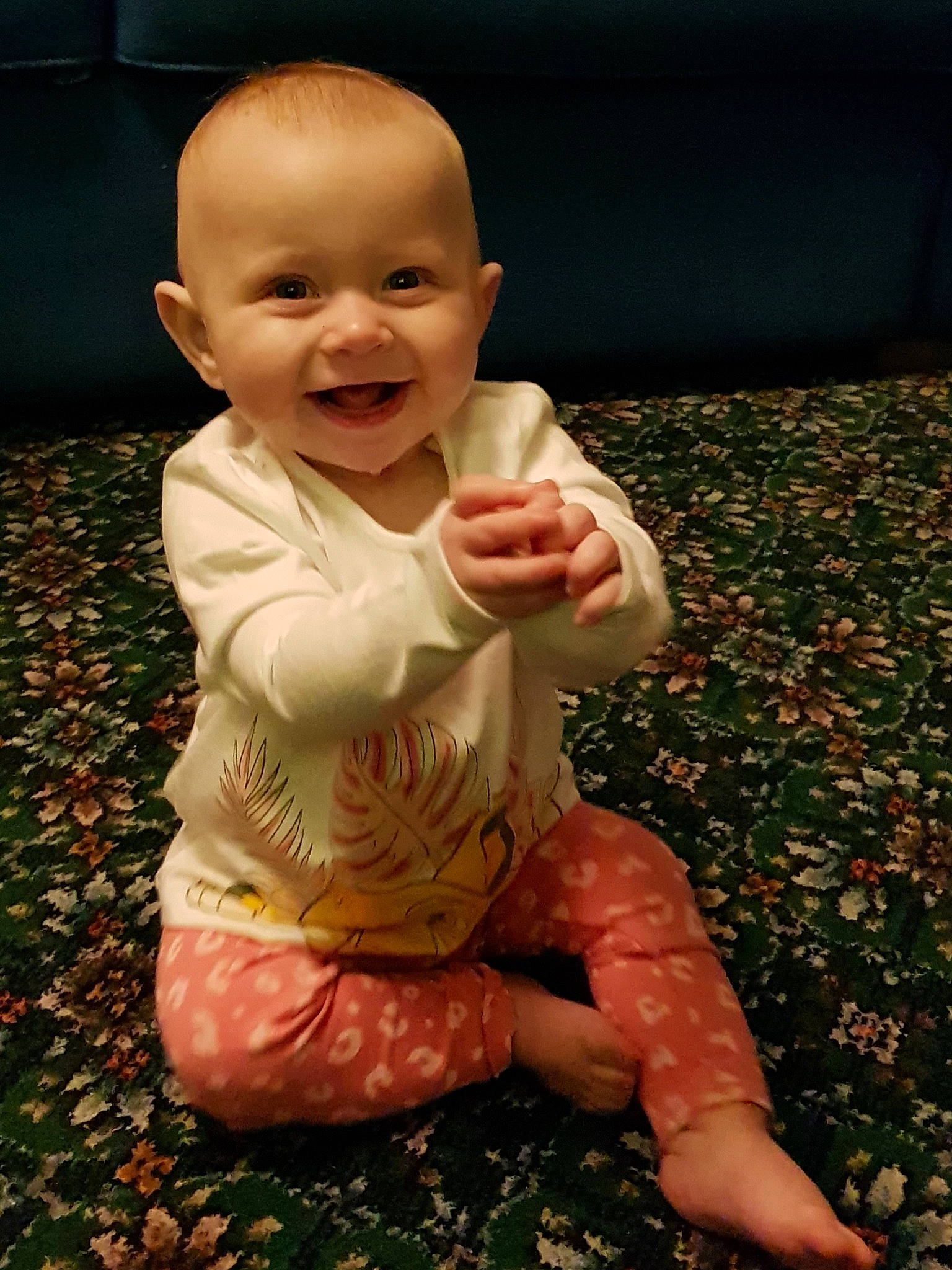 Kobi joined the competition — help win amazing prizes! arm, baby, cheek, child, facial_expression, finger, fun, grass, hand, head, joy, person, sitting, skin, smile, thumb, toddler