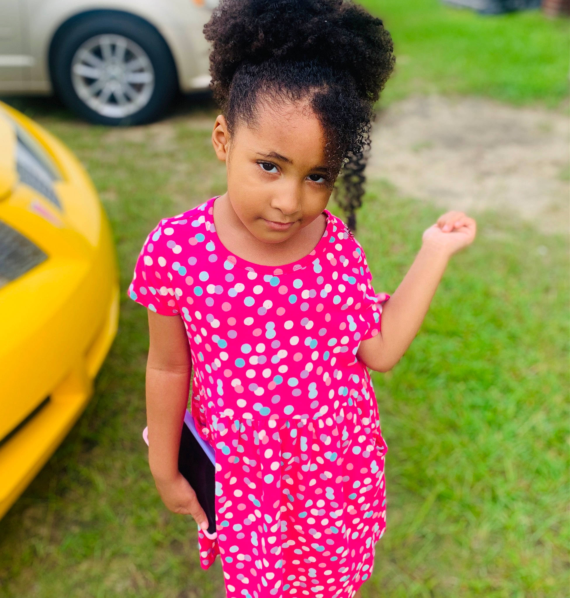 Kaylee is registered to the contest to win money with this photo: automotive_design, automotive_lighting, automotive_tire, baby_toddler_clothing, car, dress, grass, green, happy, joy, motor_vehicle, person, photograph, plant, sleeve, smile, tire, toddler, vehicle, vehicle_door