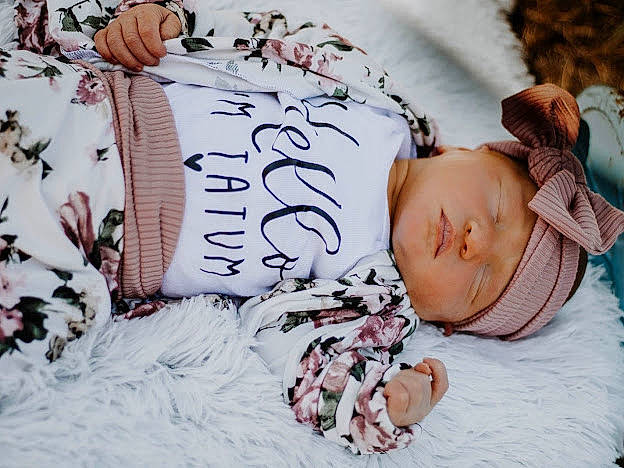 Tatum joined the competition — help win amazing prizes! baby, baby_sleeping, baby_toddler_clothing, bed, bed_sheet, bedding, bedtime, child, comfort, font, fur, happy, headwear, linens, pattern, person, room, sitting, sleeve, toddler