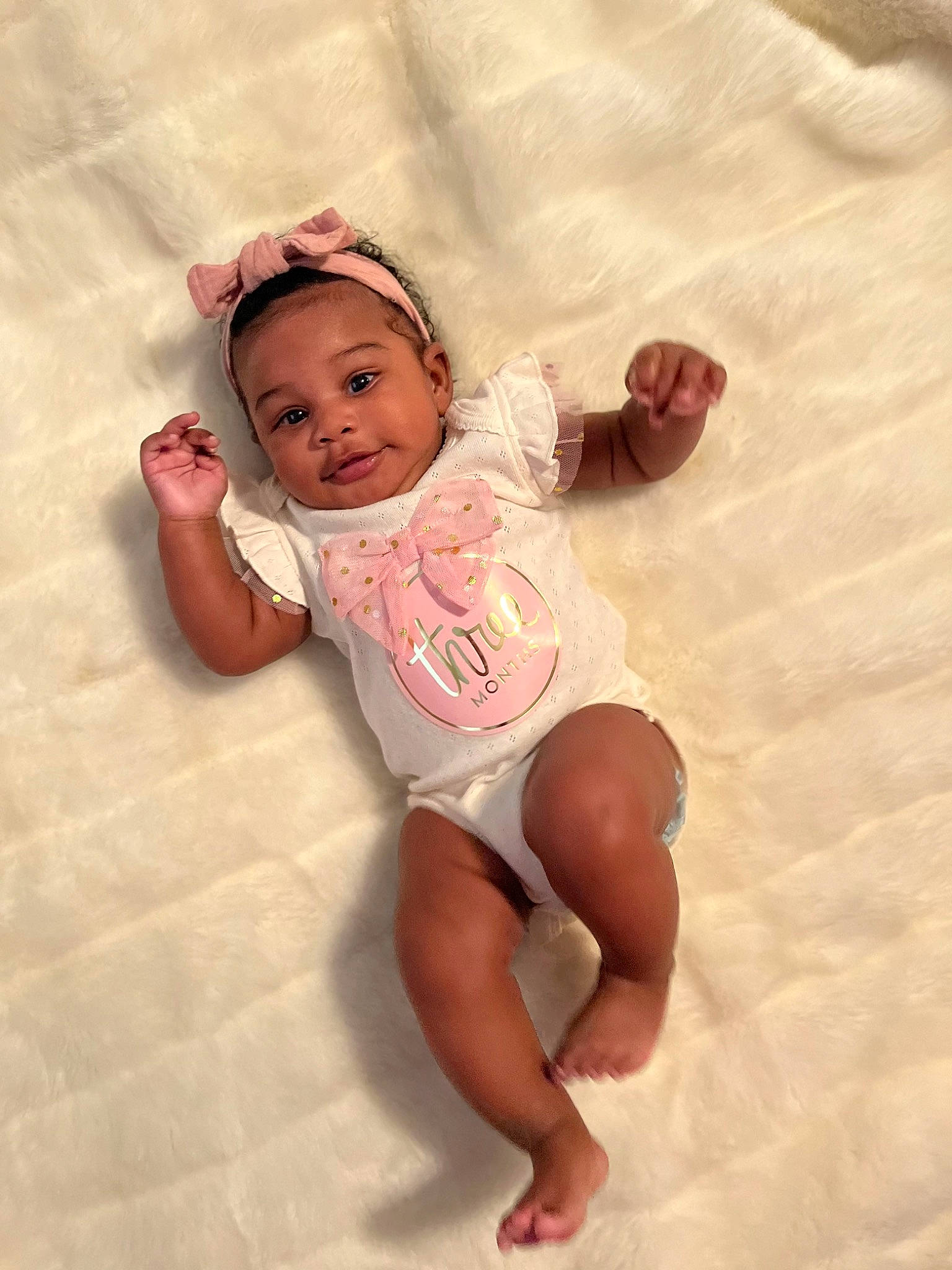 Dream is registered to the contest to win money with this photo: arm, baby, baby_toddler_clothing, cheek, comfort, eye, face, finger, flooring, foot, hand, happy, head, mouth, person, skin, sleeve, textile, thigh, thumb