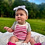 baby, child, outdoor, grass, blanket, headband, pink, socks, shoes, cute, portrait, sitting, nature, greenery, knitwear, expression, young, infant, sky, daylight