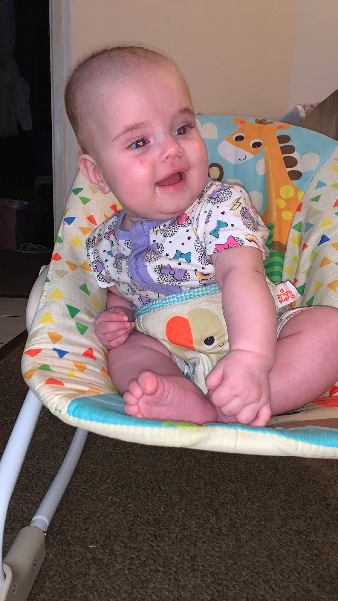 Laylah joined the competition — help win amazing prizes! baby, baby_products, baby_toddler_clothing, cheek, child, comfort, finger, fun, happy, head, human_body, iris, lap, pattern, person, pink, sitting, skin, sleeve, smile