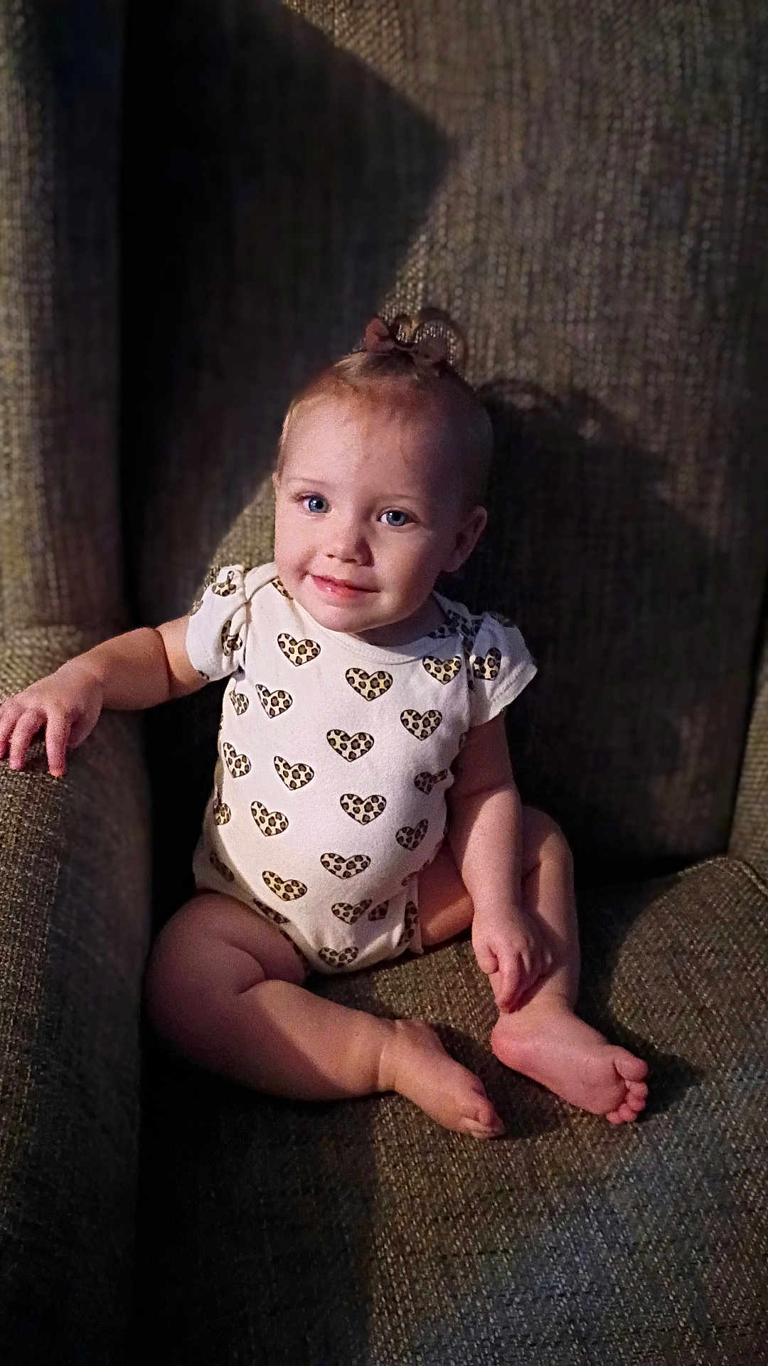 Kayetta joined the competition — help win amazing prizes! armchair, baby, barefoot, bow, child, cozy, cute, face, furniture, happy, heart_pattern, indoor, light_shadow, onesie, portrait, sitting, skin, smile, toddler, young_child