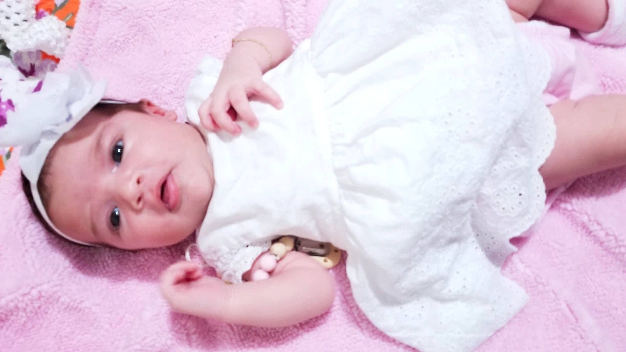 María joined the competition — help win amazing prizes! baby, baby_sleeping, baby_toddler_clothing, cheek, child, headwear, nose, person, pink, portrait_photography, product, skin, smile, toddler