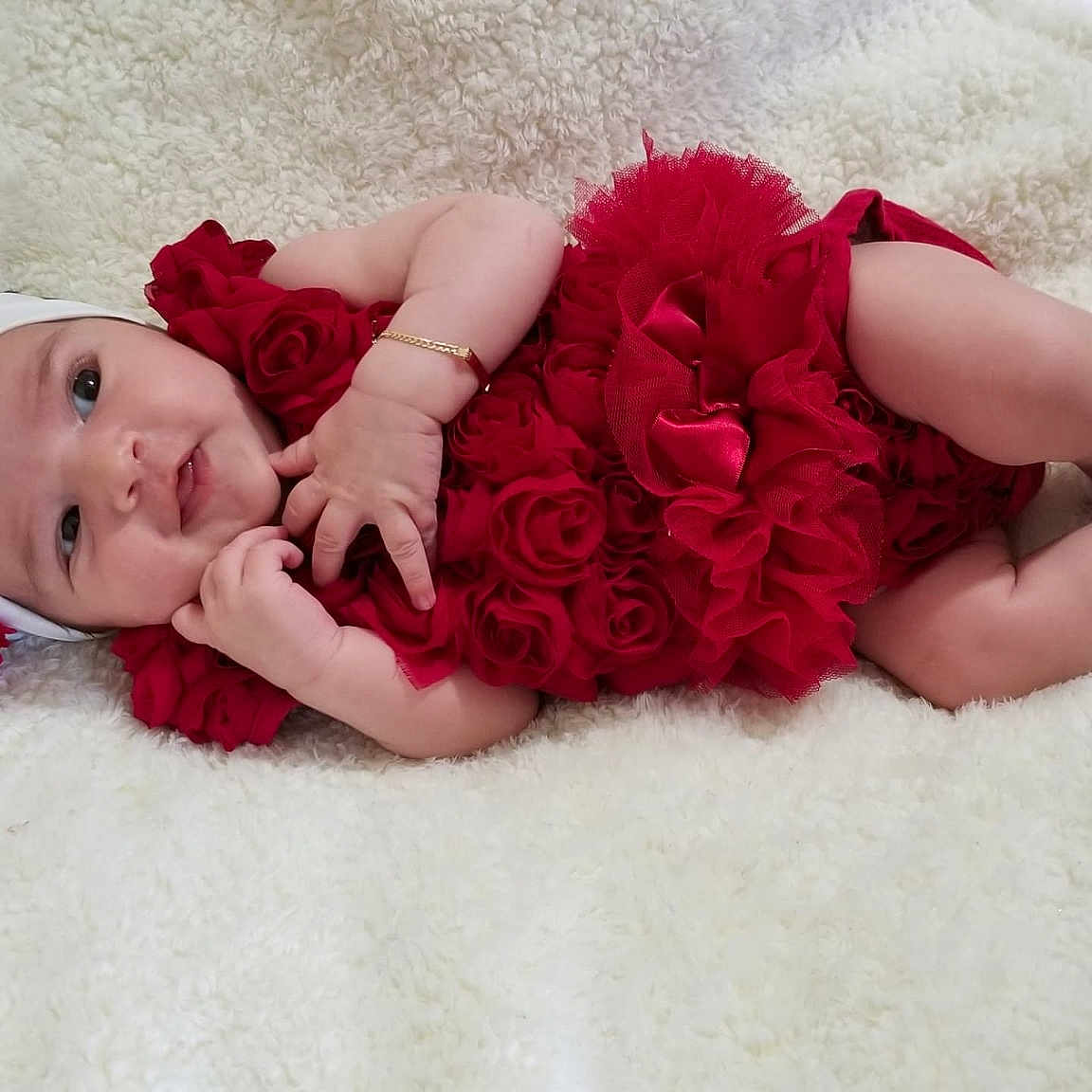 María is registered to the contest to win money with this photo: baby, child, costume_accessory, fashion_accessory, hair_accessory, pink, red, toddler