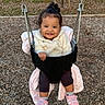 toddler, child, swing, playground, smile, happy, jacket, shoes, blanket, outdoor, woodchips, fence, person, play, fun, baby, cute, seat, park, daylight
