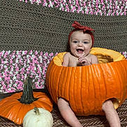 Ivy joined the competition — help win amazing prizes! baby, clothing, costume, face, food, happy, hat, head, herbal, herbs, leaf, person, photography, plant, portrait, pottedplant, produce, pumpkin, squash, vegetable