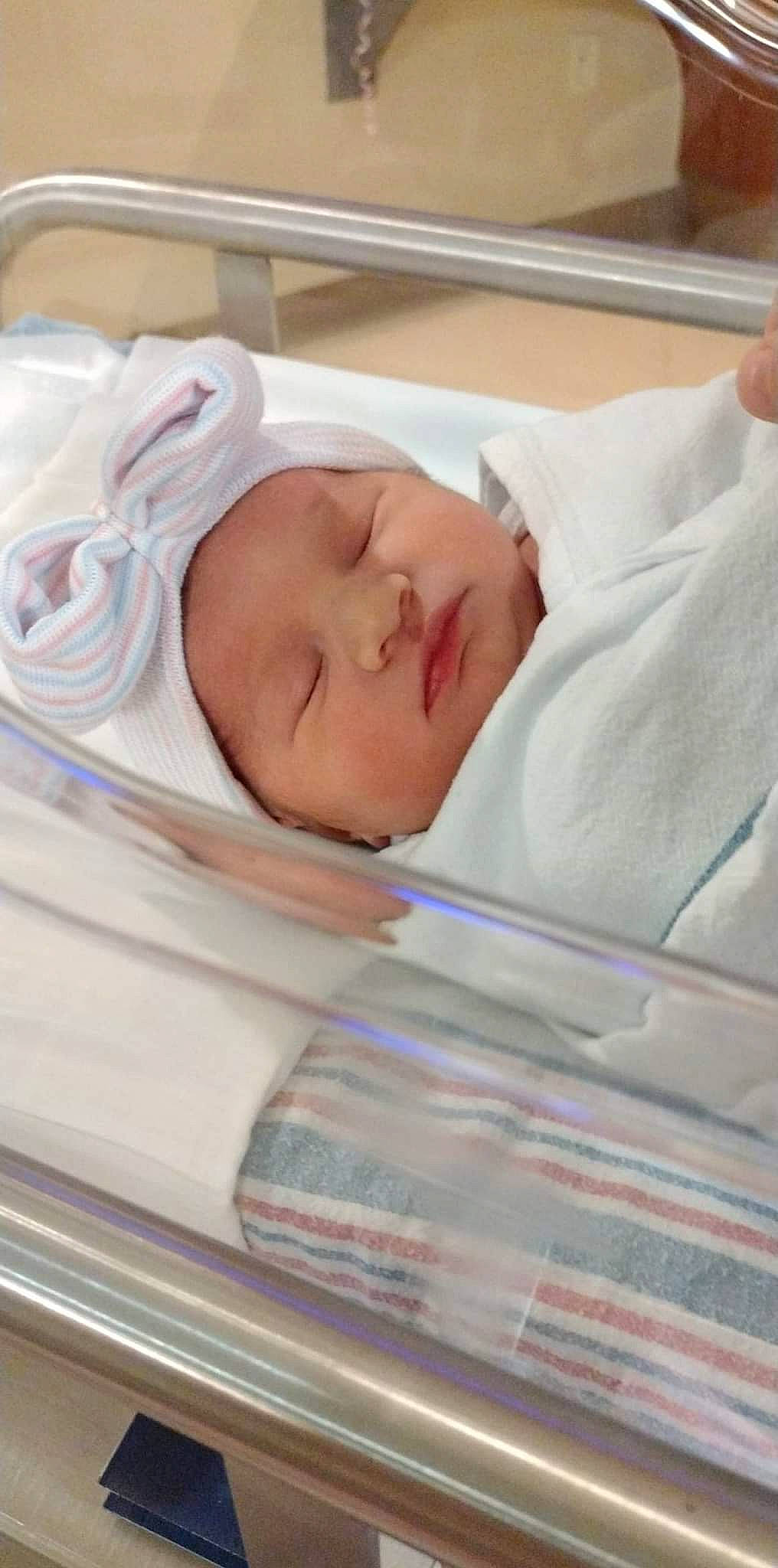 Judith is registered to the contest to win money with this photo: baby, baby_products, baby_safety, baby_sleeping, baby_toddler_clothing, bedtime, book, child, childbirth, comfort, eyelash, headwear, infant_bed, linens, medical_equipment, nap, person, room, sleep, toddler