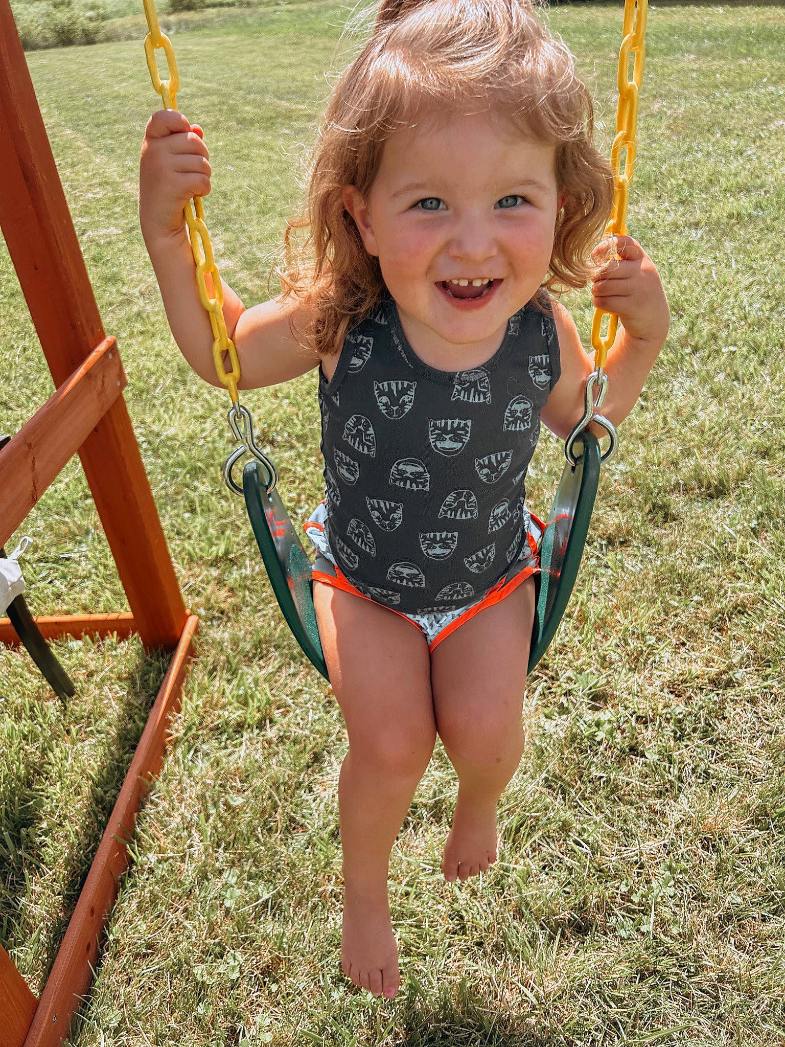 Kingsley is registered to the contest to win money with this photo: barefoot, blond, child, city, facial_expression, finger, fun, grass, happy, human_body, joy, leisure, people_in_nature, person, plant, playground, recreation, smile, summer, thigh