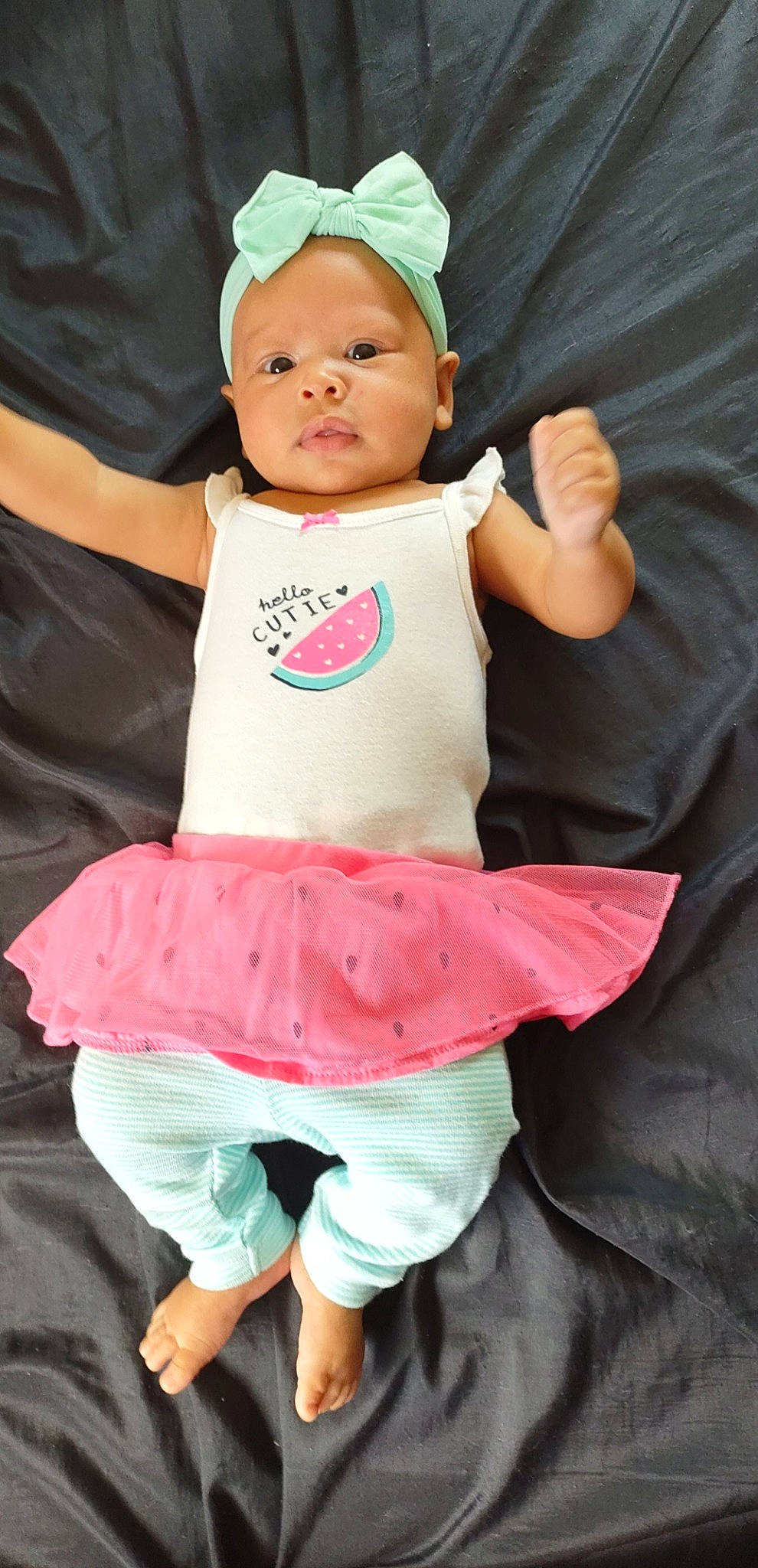 Emberlee is registered to the contest to win money with this photo: baby, baby_toddler_clothing, baseball_cap, cap, cheek, child, chin, fun, gesture, happy, hat, magenta, mammal, person, pink, product, skin, sleeve, t_shirt, toddler