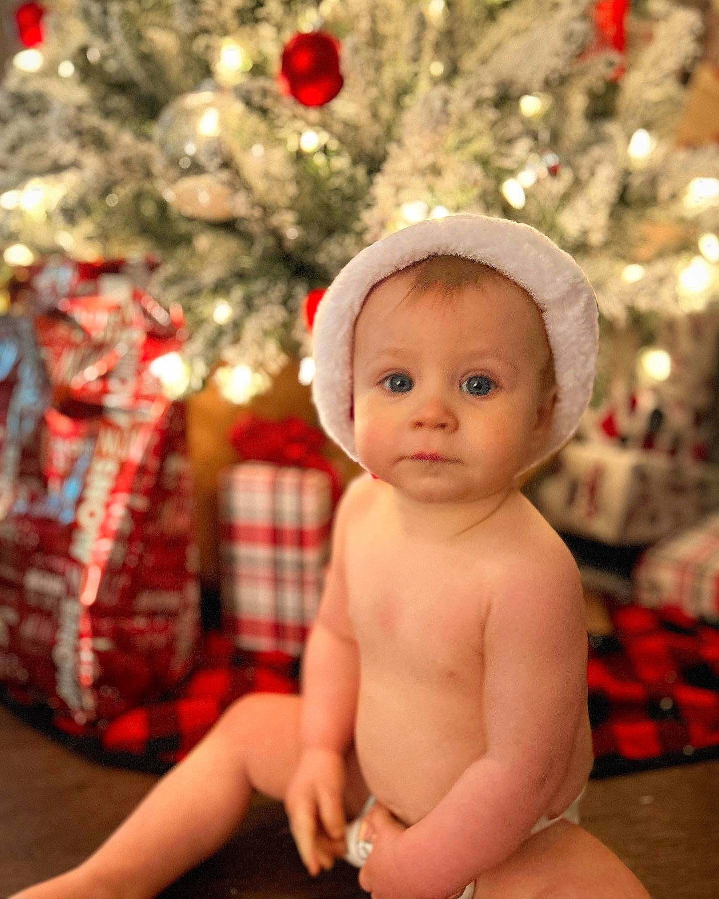 Easton joined the competition — help win amazing prizes! baby, chest, child, christmas, christmas_decoration, christmas_ornament, christmas_tree, event, eye, fun, happy, head, holiday, holiday_ornament, human_body, ornament, person, plant, smile, toddler