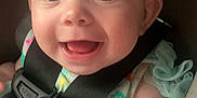 Delilah is registered to the contest to win money with this photo: baby, bow, car_seat, cheerful, child, clothing, colorful, cute, eyes, face, happy, headband, infant, portrait, seatbelt, sitting, skin, smiling, tutu, young