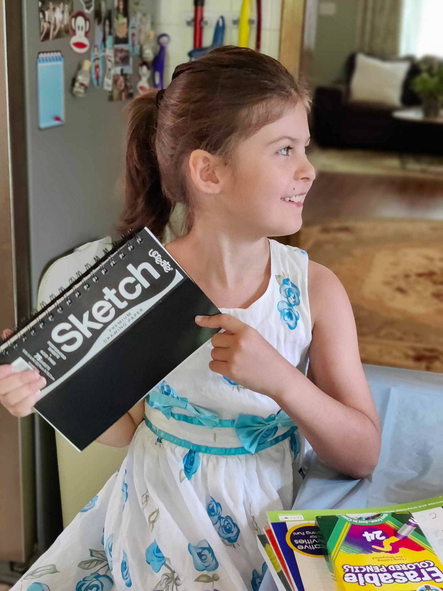 Sky joined the competition — help win amazing prizes! child, electric_blue, event, fashion_design, fun, happy, houseplant, jewellery, joy, leisure, logo, person, picture_frame, publication, room, shelf, sitting, t_shirt