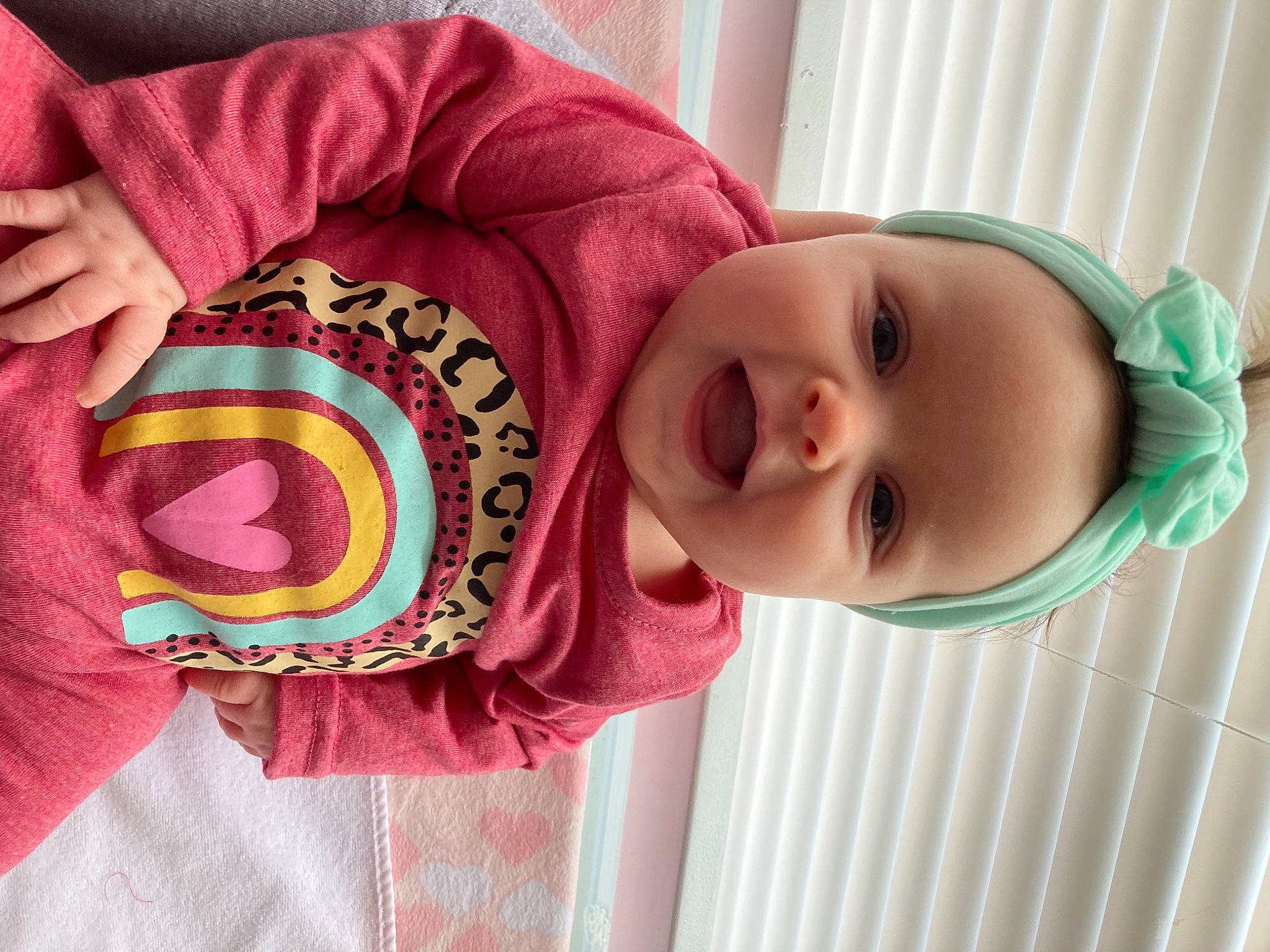 Hazel Grace joined the competition — help win amazing prizes! baby, baby_toddler_clothing, cheek, eye, eyelash, face, facial_expression, happy, hat, head, headgear, lip, neck, nose, person, pink, product, skin, sleeve, smile