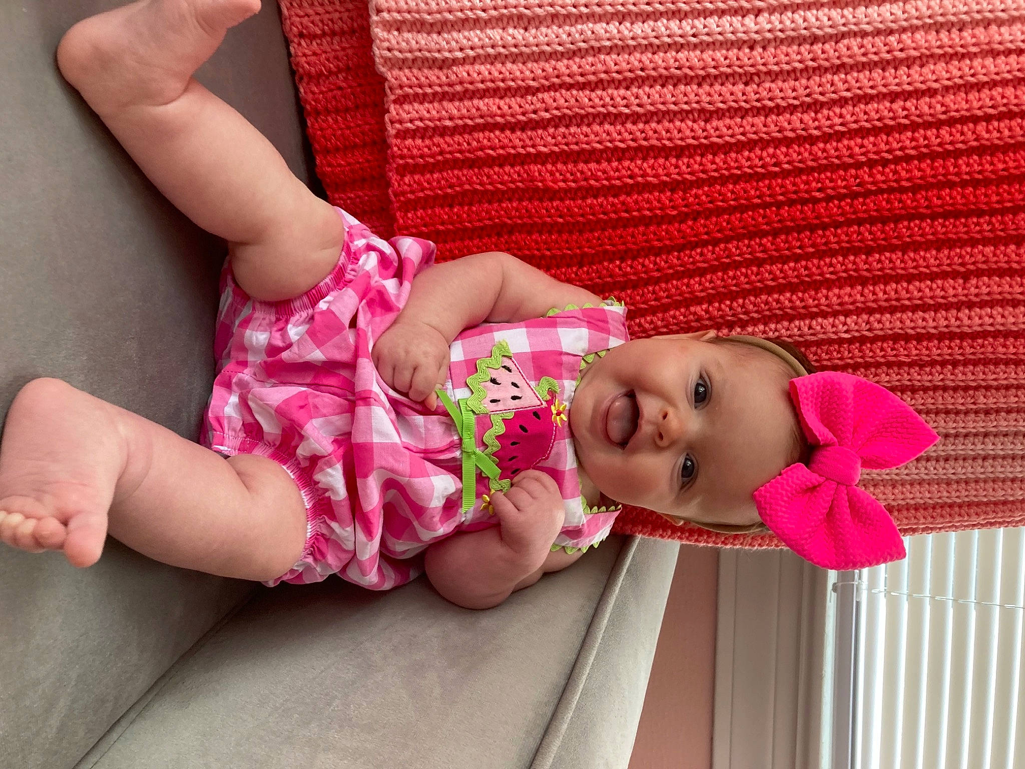 Hazel Grace is registered to the contest to win money with this photo: baby, baby_toddler_clothing, cheek, comfort, dress, facial_expression, happy, headwear, human_body, joint, leg, magenta, person, pink, plant, product, shoulder, skin, sleeve, textile