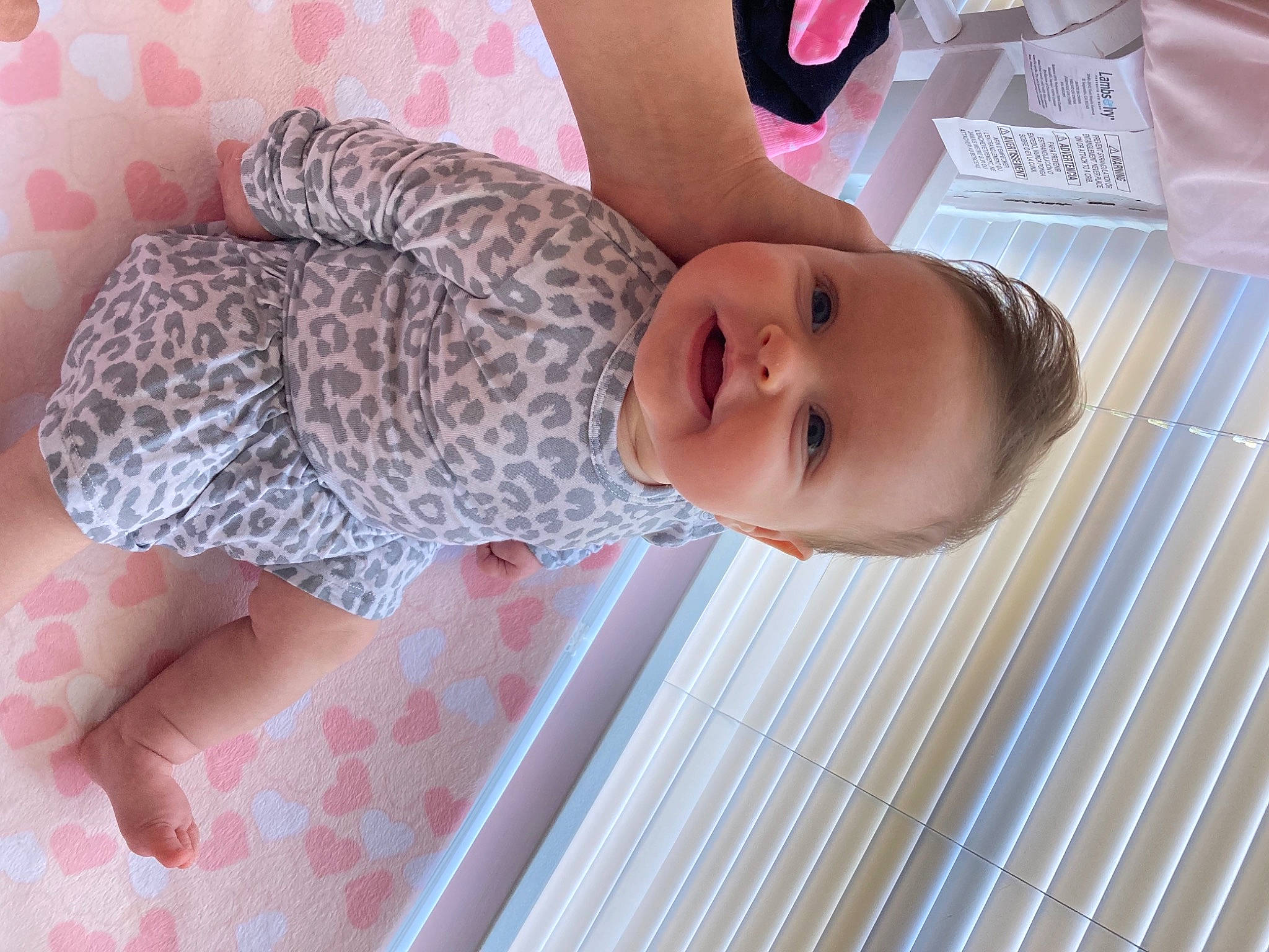 Hazel Grace is registered to the contest to win money with this photo: baby, baby_products, baby_toddler_clothing, child, comfort, eyelash, finger, hand, happy, linens, nail, pattern, person, pink, room, skin, sleeve, smile, thumb, toddler