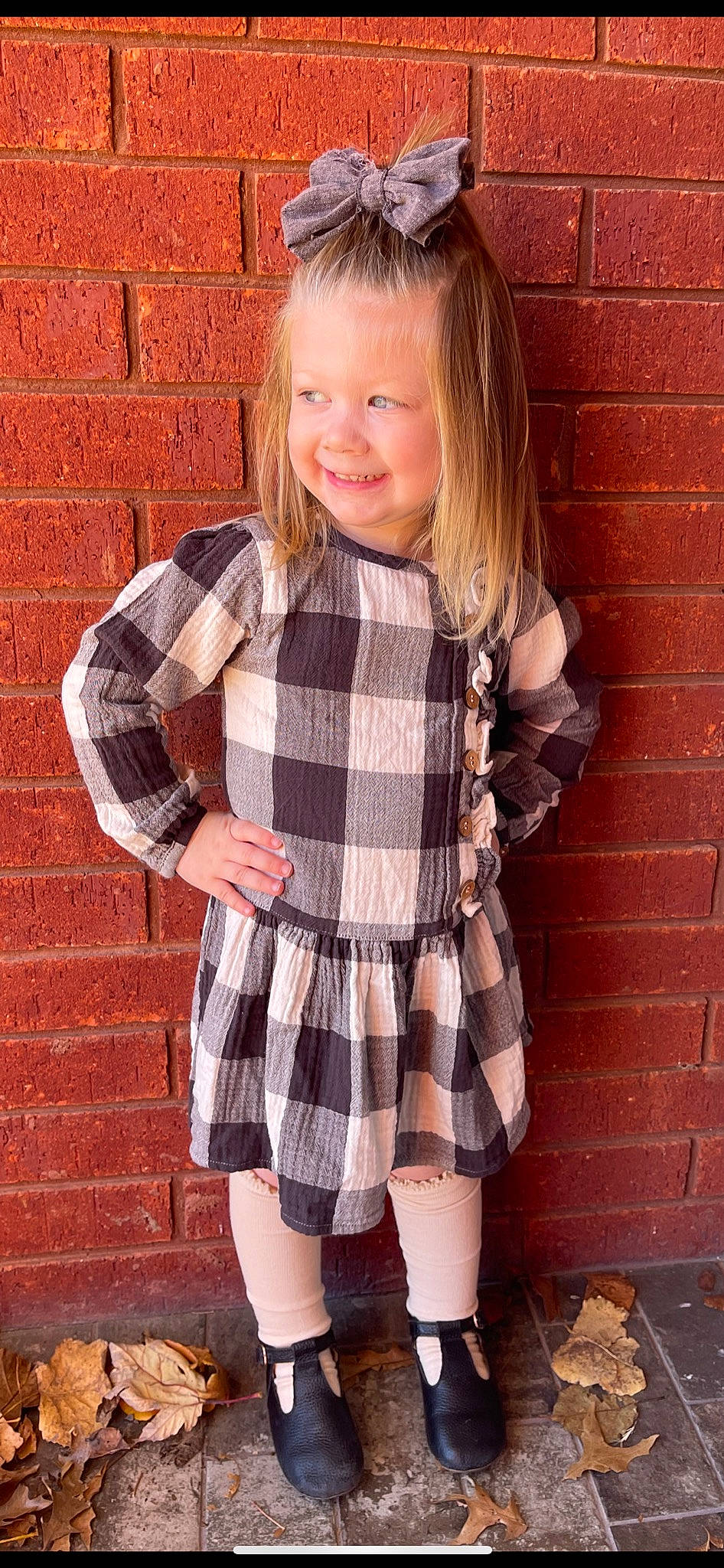 Raylin joined the competition — help win amazing prizes! brick, brickwork, collar, day_dress, dress_shirt, face, hair, joy, knee, neck, one_piece_garment, outerwear, person, pink, plaid, sleeve, smile, street_fashion, tartan, textile