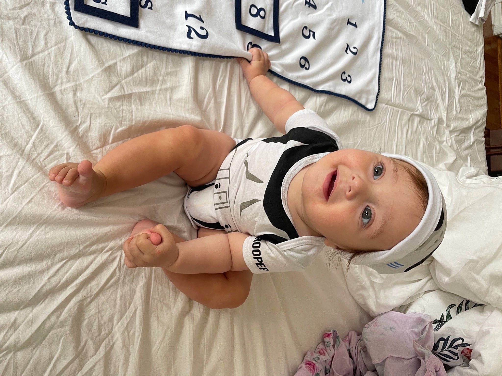 Miguel joined the competition — help win amazing prizes! baby_toddler_clothing, child, comfort, dress, eye, finger, foot, gesture, happy, headwear, human_leg, linens, pattern, person, skin, sleeve, smile, t_shirt, textile, thigh