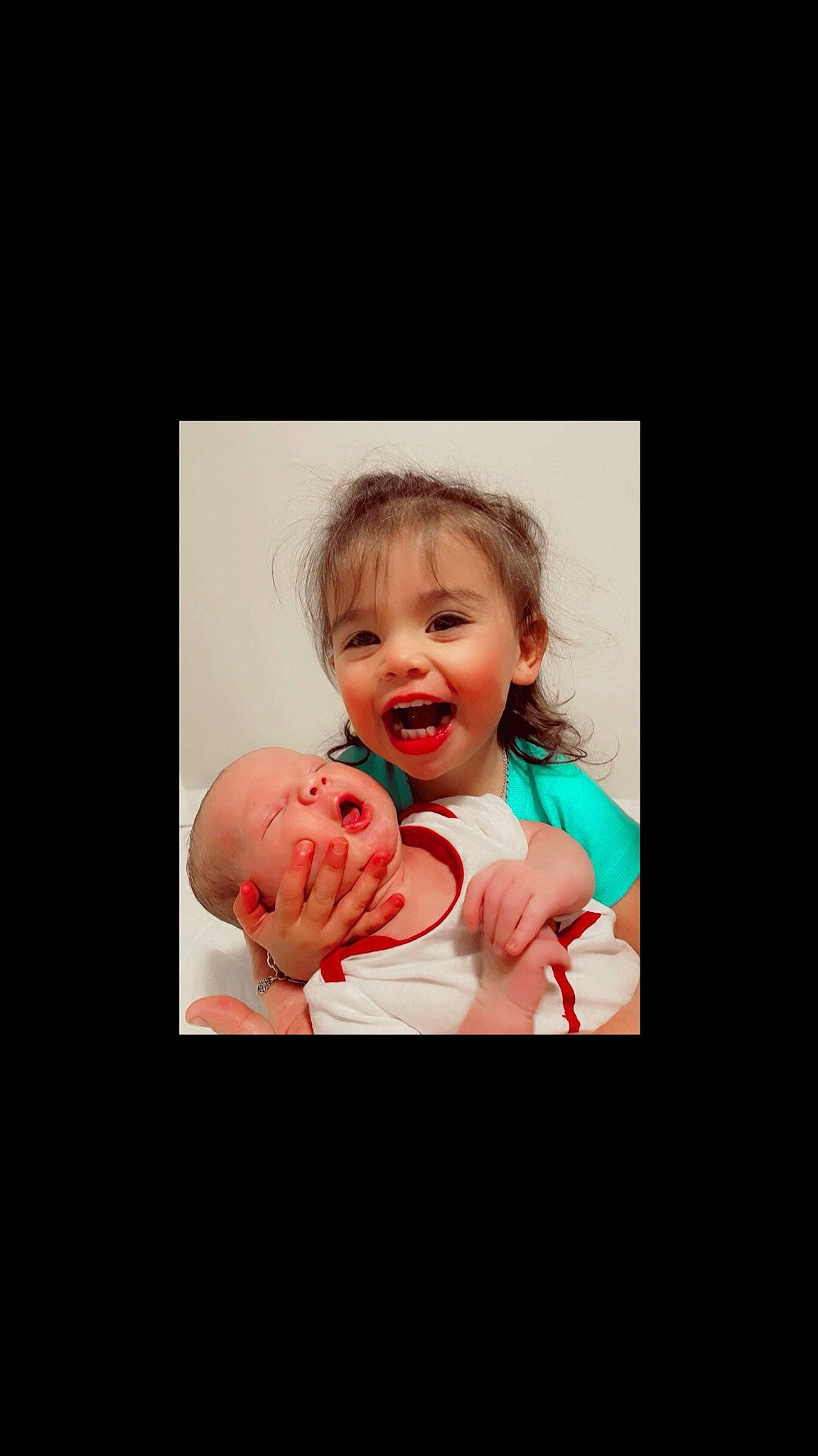 Raylen is registered to the contest to win money with this photo: art, baby, baby_toddler_clothing, cheek, child, chin, comfort, flash_photography, fun, gesture, happy, mouth, nose, person, portrait, sitting, skin, sleeve, smile, t_shirt