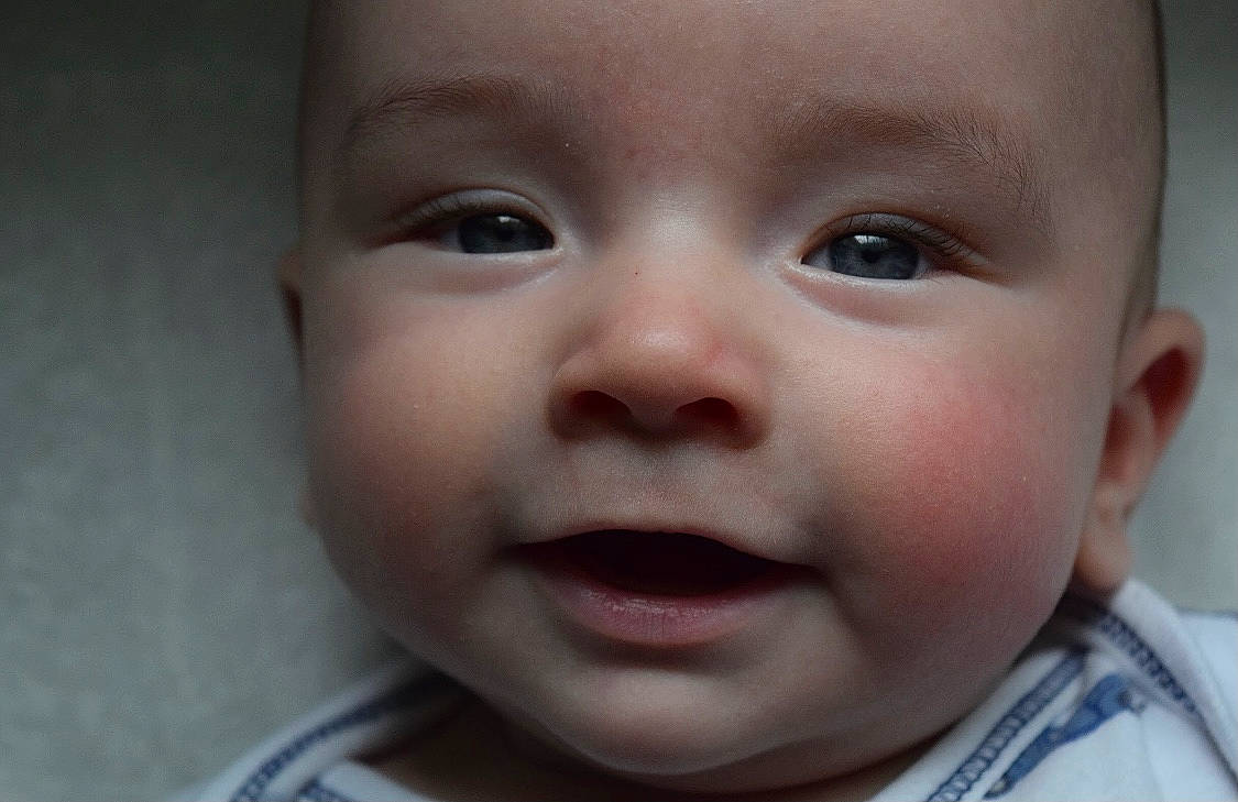 Kaden is registered to the contest to win money with this photo: baby, cheek, child, chin, close_up, ear, eyebrow, eyelash, finger, forehead, fun, gesture, happy, iris, lip, mouth, nose, person, skin, smile