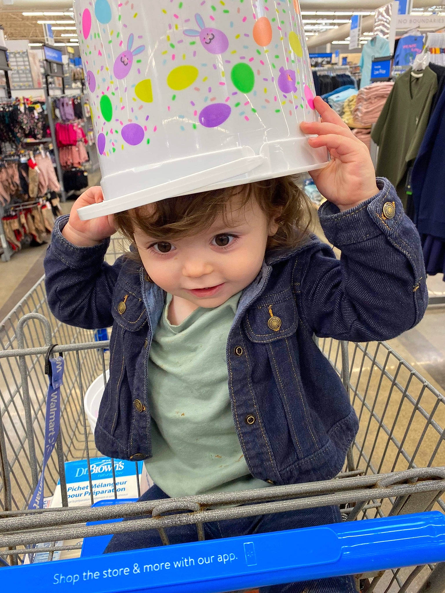 Wrenley is registered to the contest to win money with this photo: cart, child, customer, electric_blue, event, fashion_accessory, fun, headwear, joy, magenta, market, pattern, people, person, personal_protective_equipment, photograph, public_space, retail, shopping, shopping_cart