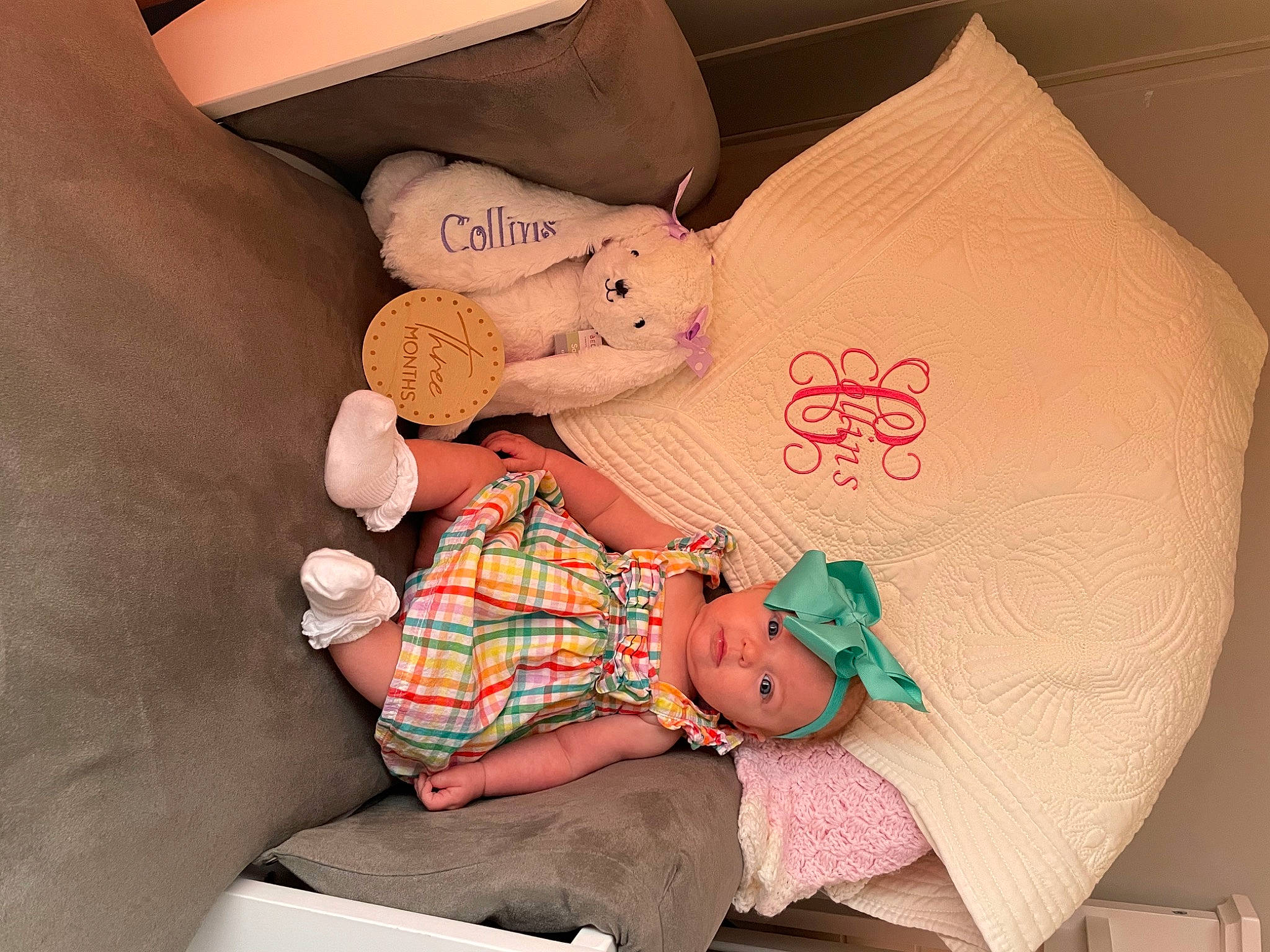 Collins joined the competition — help win amazing prizes! abdomen, baby, baby_toddler_clothing, bed, bedding, child, comfort, couch, headwear, human_leg, leg, linens, pattern, person, pillow, pink, plaid, sock, tartan, textile