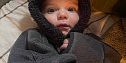 Nolan joined the competition — help win amazing prizes! baby, blanket, bonnet, cap, clothing, coat, face, fleece, hat, head, hood, hoodie, jacket, knitwear, newborn, person, photography, portrait, sweater, sweatshirt