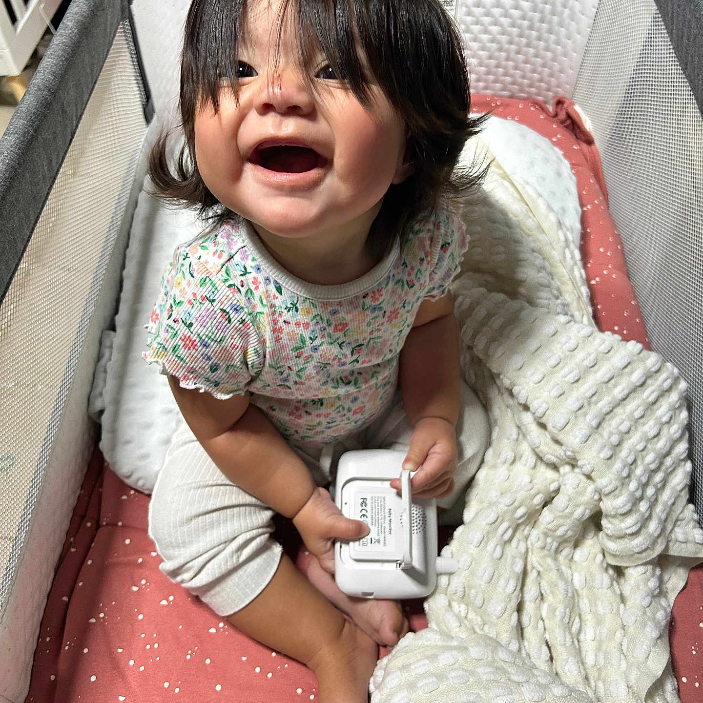 Leilani joined the competition — help win amazing prizes! baby, bed, blanket, bodypart, couch, cradle, crib, crying, electronics, face, finger, furniture, hand, head, homedecor, infantbed, person, phone, photography, portrait