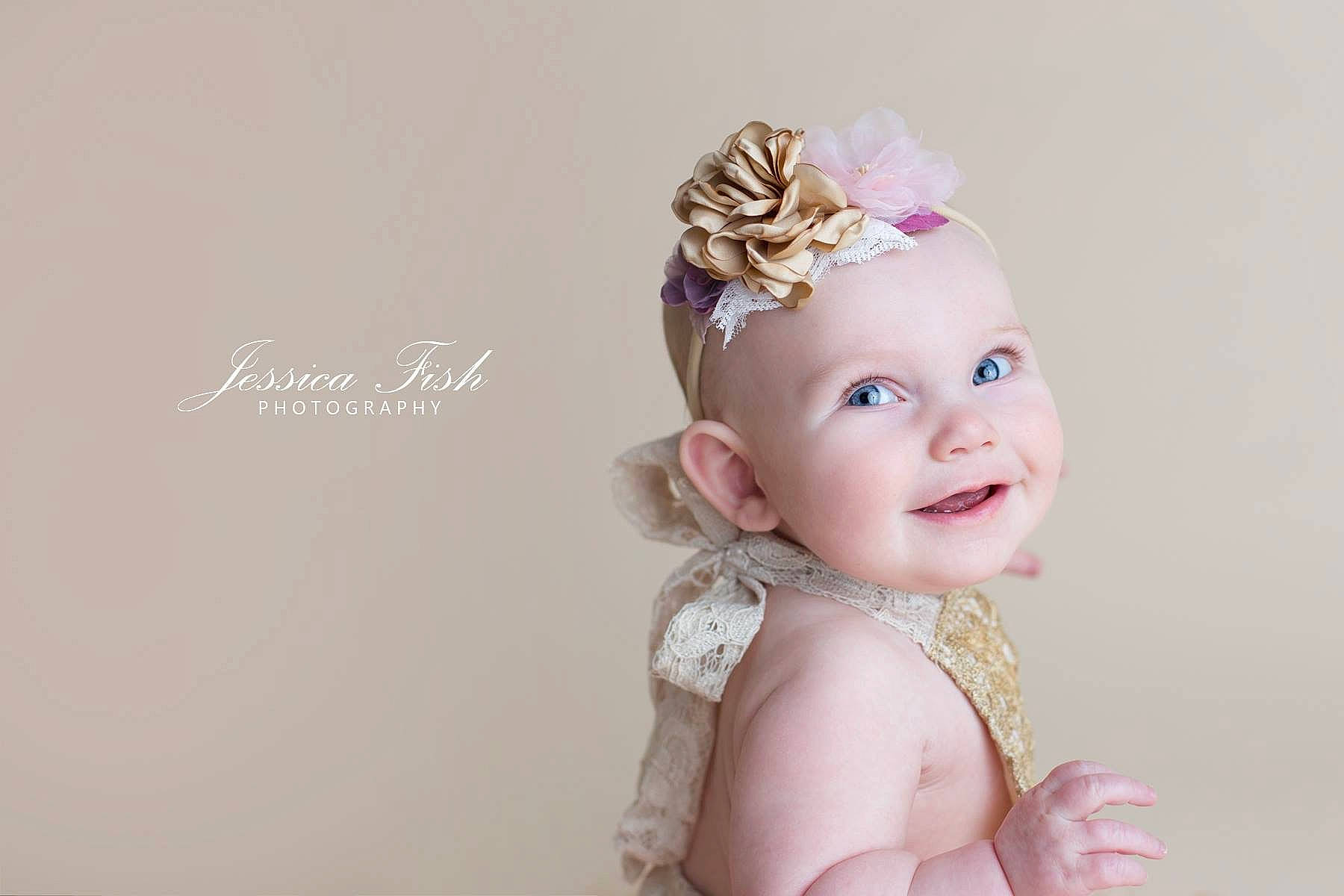 Azlyn is registered to the contest to win money with this photo: baby, child, child_model, clothing, costume_accessory, crown, fashion_accessory, hair, hair_accessory, hairstyle, head, headband, headgear, headpiece, person, pink, smile, toddler