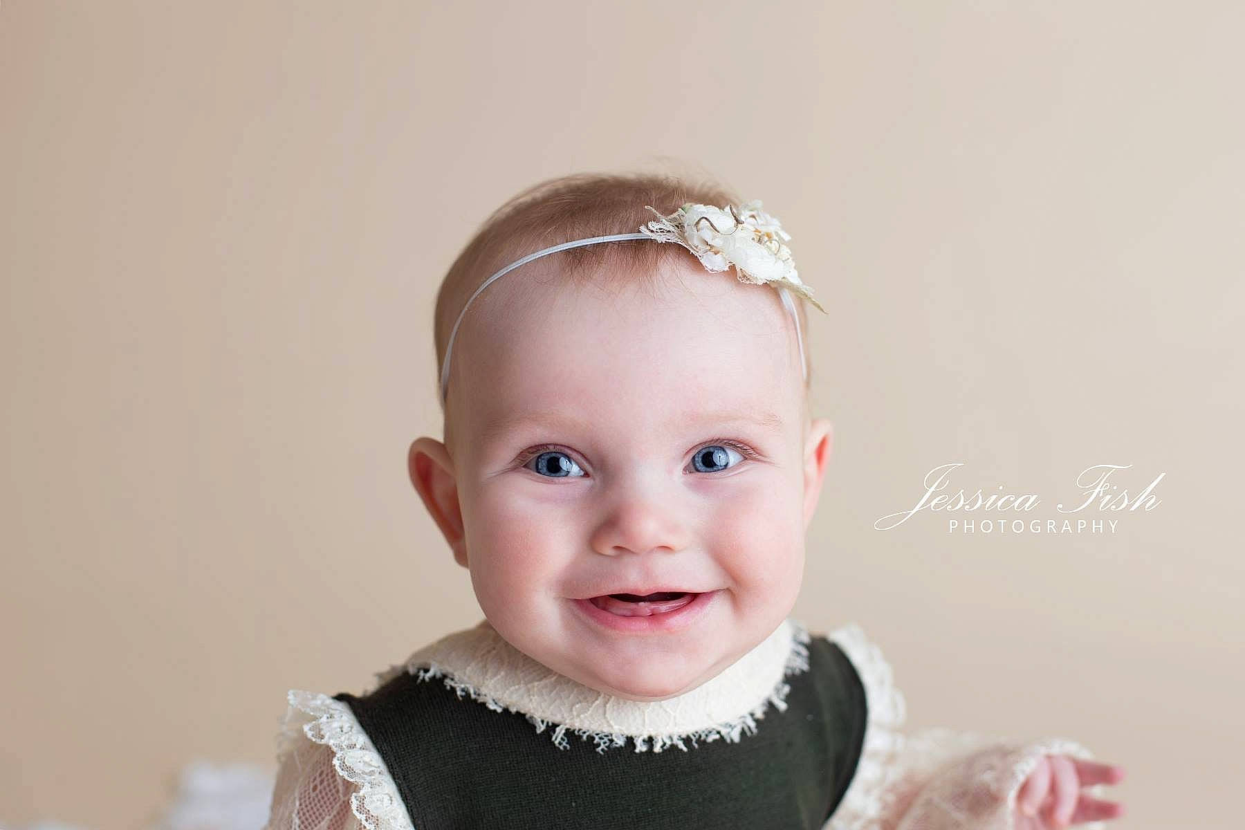 Azlyn is registered to the contest to win money with this photo: baby, cheek, child, ear, face, fashion_accessory, forehead, hair, hair_accessory, head, headgear, headpiece, lip, person, photograph, photography, portrait_photography, skin, smile, toddler