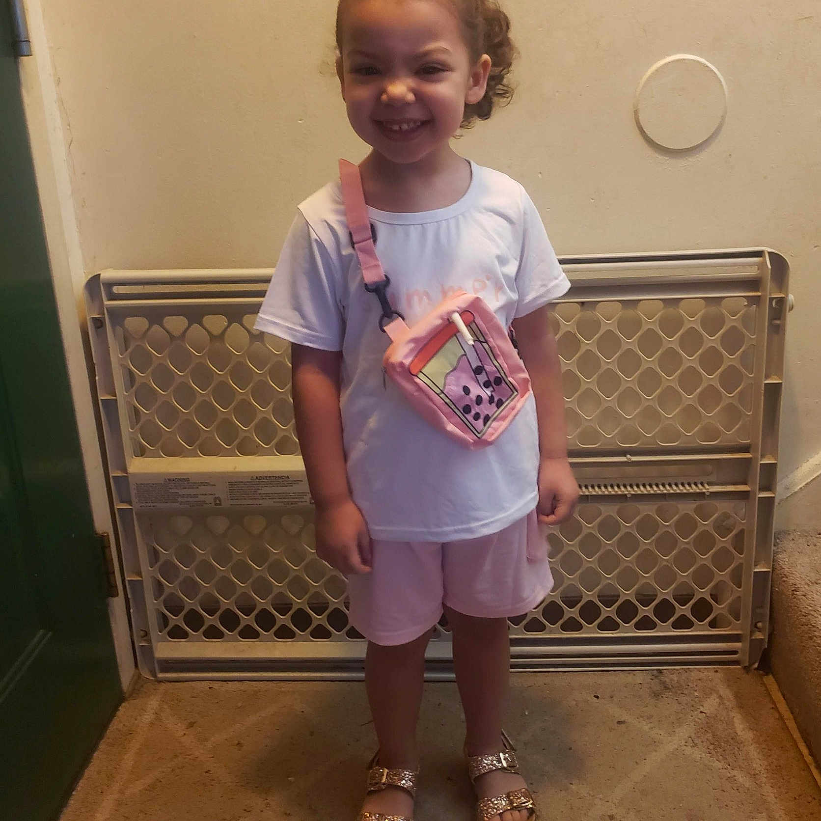 Amiah Faith is registered to the contest to win money with this photo: accessories, bag, child, clothing, face, female, girl, handbag, head, person, photography, portrait, racket, shorts, sleeve, sport, standing, t_shirt, tennis, tennisracket