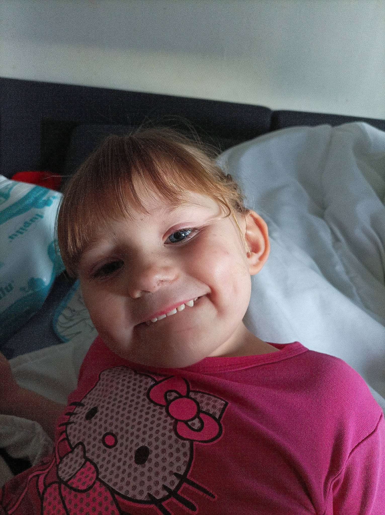 Mylena participe au concours pour gagner de l'argent avec cette photo : baby_toddler_clothing, cheek, child, chin, eyebrow, face, facial_expression, happy, iris, joy, lip, mammal, mouth, nose, person, pink, skin, sleeve, smile, t_shirt